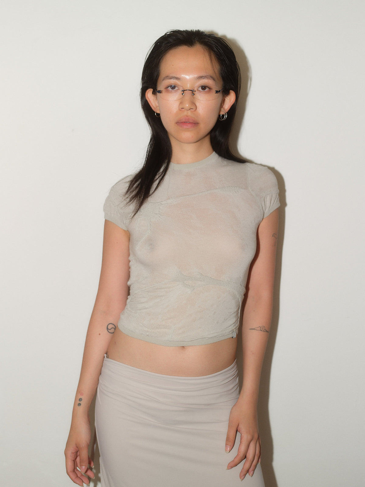 Knitted Sheer T-Shirt designed by Christina Seewald. Sustainable, designed and made in Europe. Best Quality Yarns from Italy.