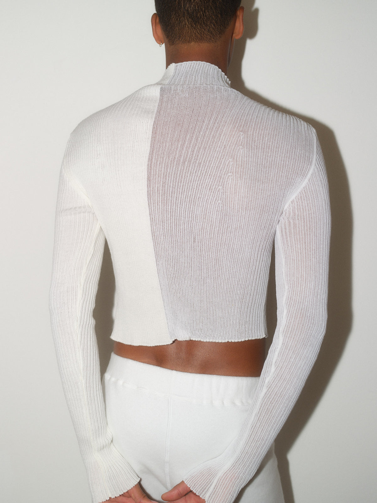 Knitted Draped Top designed by Christina Seewald. Sustainable, designed and made in Europe. Best Quality Yarns from Italy.