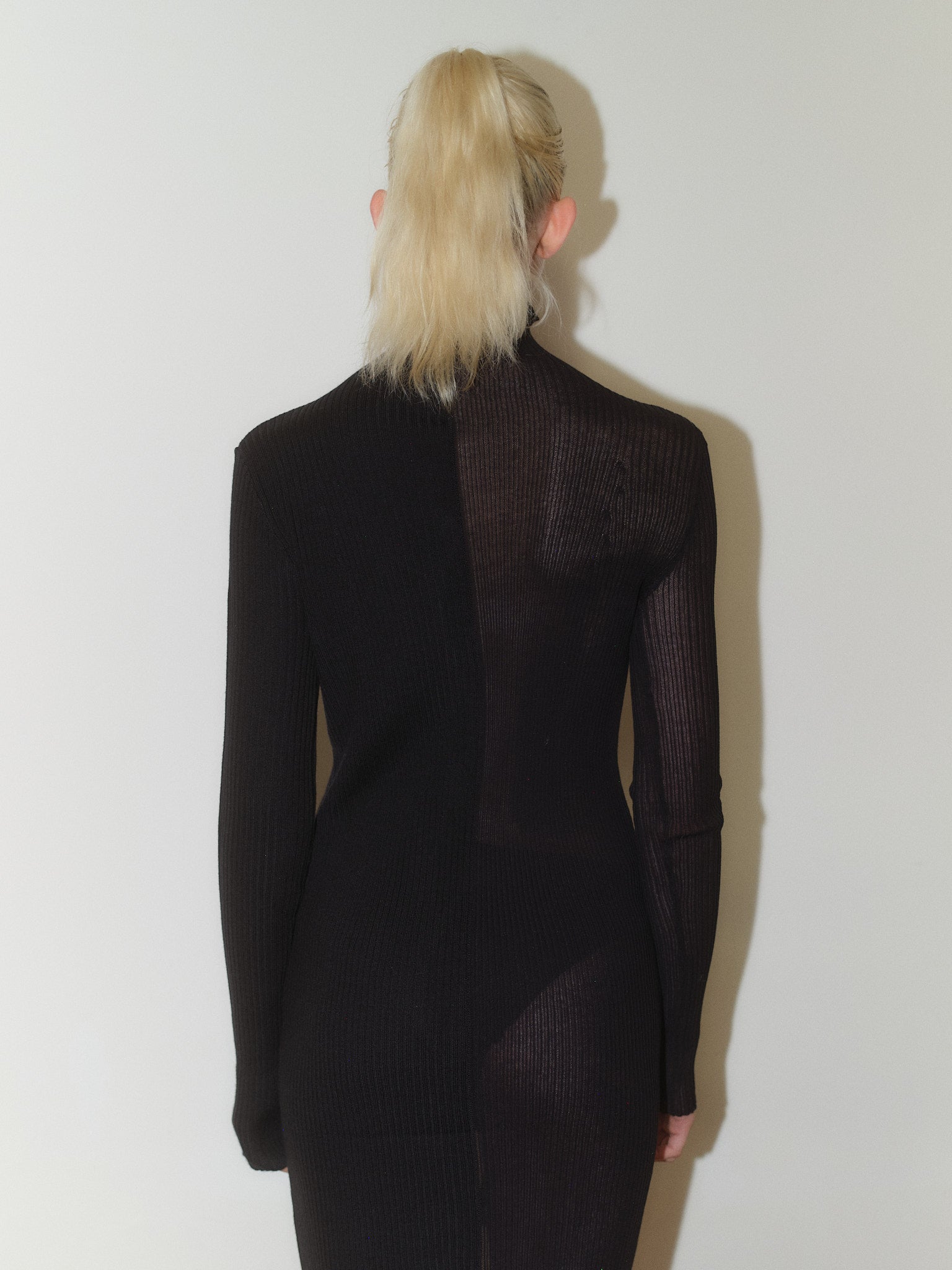 Knitted Dress designed by Christina Seewald. Sustainable, designed and made in Europe. Best Quality Yarns from Italy.