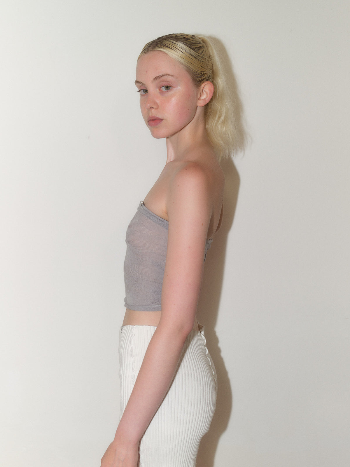 Knitted Sheer Tube Top designed by Christina Seewald. Sustainable, designed and made in Europe. Best Quality Yarns from Italy.